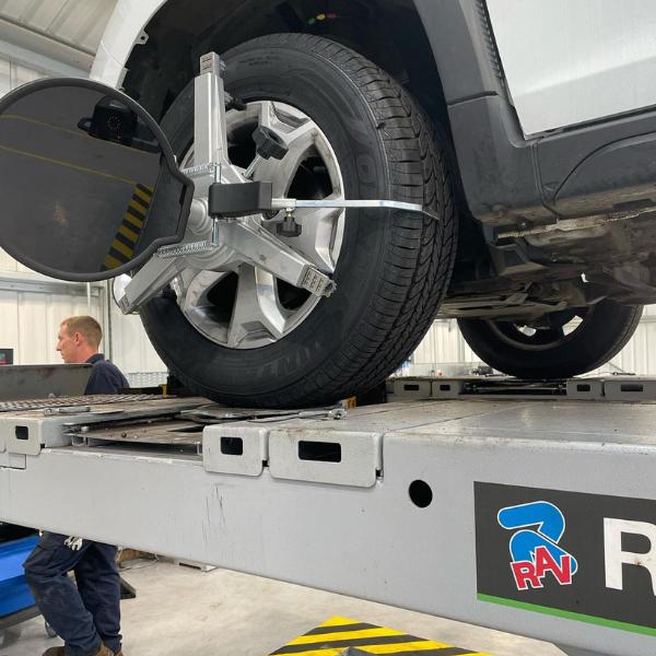 6 Wheel alignment underway in the workshop
